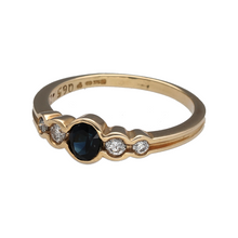 Load image into Gallery viewer, New 9ct Yellow Gold Diamond &amp; Sapphire Set Band Ring in size O with the weight 2.40 grams. The sapphire stone is 5mm by 4mm and there is approximately 0.20ct of diamond content set in the band in total
