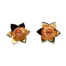 Load image into Gallery viewer, Add a touch of Welsh heritage and elegance to your jewellery collection with these pre-owned 9ct yellow and rose gold Clogau daffodil stud earrings, featuring:

Design: Beautiful daffodil-shaped stud earrings, symbolising Wales and new beginnings.
Material: 9-carat yellow and rose gold, creating a stunning two-tone effect that enhances the floral design.
Weight: A substantial 4.10 grams, ensuring a high-quality and comfortable feel.
A charming and meaningful accessory
