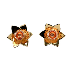 Add a touch of Welsh heritage and elegance to your jewellery collection with these pre-owned 9ct yellow and rose gold Clogau daffodil stud earrings, featuring:

Design: Beautiful daffodil-shaped stud earrings, symbolising Wales and new beginnings.
Material: 9-carat yellow and rose gold, creating a stunning two-tone effect that enhances the floral design.
Weight: A substantial 4.10 grams, ensuring a high-quality and comfortable feel.
A charming and meaningful accessory