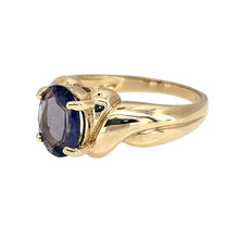 Load image into Gallery viewer, Preowned 9ct Yellow Gold &amp; Tanzanite Set Crossover Ring in size N with the weight 3.60 grams. The tanzanite stone is 9mm by 7mm
