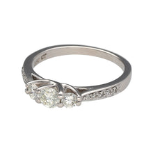 Load image into Gallery viewer, Preowned Platinum &amp; Diamond Set Trilogy Ring with diamond set shoulders. The ring in size L with the weight 4.10 grams. There is approximately 50pt of diamond content with approximate clarity VS2 - Si1 and colour K - M
