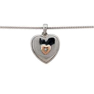 Preowned 925 Silver and 9ct Clogau Gold & Cubic Zirconia Set Clogau Heart Pendant on an adjustable 18", 20" - 22" Clogau curb chain with the weight 5.20 grams. The pendant is 2.1cm long including the bail