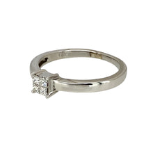 Load image into Gallery viewer, Preowned 18ct White Gold &amp; Diamond Illusion Set Solitaire Ring in size J with the weight 2.30 grams. There are four princess cut diamonds set together to form the illusion of a bigger stone and the stone is approximately 12pt of diamond content in total
