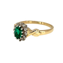 Load image into Gallery viewer, Preowned 9ct Yellow and White Gold Diamond &amp; Emerald coloured stone Set Cluster Ring in size L with the weight 2.20 grams. The emerald coloured stone is 6mm by 4mm and there is approximately 10pt of diamond content
