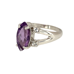 Preowned 9ct White Gold Amethyst & Cubic Zirconia Set Ring in size N with the weight 3.30 grams. The amethyst stone is 12mm by 6mm