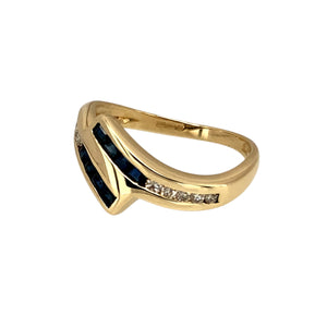 Preowned 9ct Yellow Gold Diamond & Sapphire Set Wrap Around Ring in size M with the weight 2.40 grams. The front of the ring is approximately 9mm high