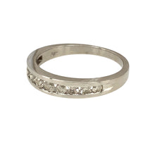 Load image into Gallery viewer, Preowned 9ct White Gold &amp; Diamond Set Band Ring in size P with the weight 2.70 grams. The front of band is 4mm wide and contains approximately 0.50ct of diamond content in total
