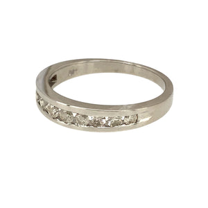 Preowned 9ct White Gold & Diamond Set Band Ring in size P with the weight 2.70 grams. The front of band is 4mm wide and contains approximately 0.50ct of diamond content in total