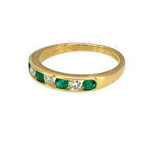 Load image into Gallery viewer, Preowned 18ct Yellow Gold Diamond &amp; Emerald Set Band Ring in size L with the weight 2.40 grams. The emerald stones are each approximately 2.5mm diameter
