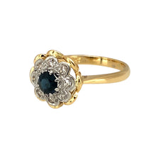 Load image into Gallery viewer, Preowned 18ct Yellow and White Gold Diamond &amp; Sapphire Set Flower Ring in size I with the weight 3.30 grams. The front of the ring is 11mm high and the sapphire stone is 4mm diameter
