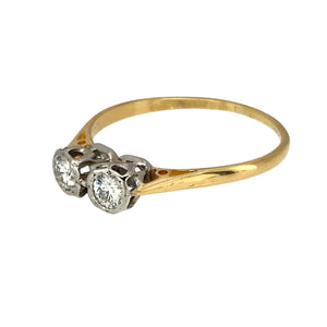 Preowned 18ct Yellow Gold & Platinum Diamond Set Double Solitaire Ring in size R with the weight 1.80 grams. There is approximately 0.28ct of diamond content set in total