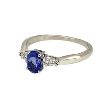 Load image into Gallery viewer, Preowned 18ct White Gold Diamond &amp; Tanzanite Set Ring in size O with the weight 2.80 grams. The oval cut tanzanite stone is approximately 6mm by 4mm
