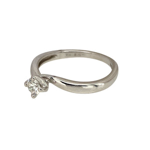 Preowned 18ct White Gold & Diamond Set Solitaire Twist Ring in size I with the weight 1.90 grams. The diamond is approximately 0.15ct of diamond content