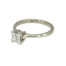 Load image into Gallery viewer, Preowned 9ct White Gold &amp; Diamond Illusion Set Solitaire Ring in size L with the weight 2.50 grams. There are four princess cut diamonds set together to give the impression of one larger stone. There is approximately 0.24ct of diamond content set in total but gives the impression of approximately 0.40ct
