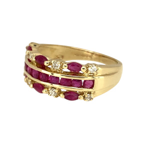 Preowned 9ct Yellow Gold Diamond & Ruby Set Three Row Ring in size N with the weight 3.60 grams. The front of the ring is 8mm wide