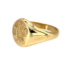 Load image into Gallery viewer, Preowned 9ct Yellow Gold Welsh Three Feather Oval Signet Ring in size X with the weight 8.30 grams. The front of the ring is 15mm high
