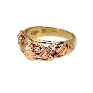 Preowned 9ct Yellow and Rose Gold & Diamond Set Clogau Tree of Life Ring in size N to O with the weight 4.60 grams. The front of the ring is 8mm wide