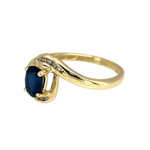 Load image into Gallery viewer, Preowned 9ct Yellow Gold Diamond &amp; Sapphire Set Twist Ring in size M with the weight 1.70 grams. The sapphire stone is 6mm by 4mm
