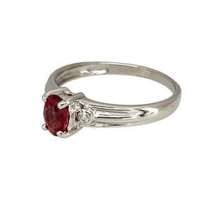 Preowned 9ct White Gold Diamond & Ruby Set Ring in size N with the weight 2.10 grams. The ruby stone is 6mm by 4mm