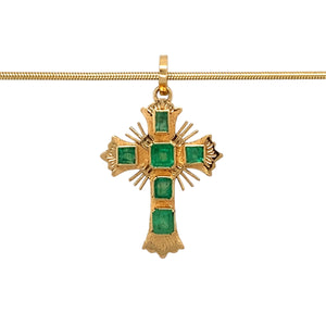 Preowned 18ct Yellow Gold & Emerald Set Cross Pendant on a 16" snake chain with the weight 6.50 grams. The pendant is 3.2cm long including the bail and the center emerald is approximately 3.5mm by 3.5mm