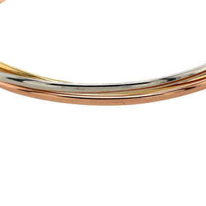 Preowned 9ct Yellow Gold Three Band Twist Bangle with the weight 14.50 grams. The individual bangle width is 2mm wide and the bangle diameter is 7cm