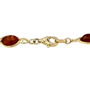 Preowned 9ct Yellow Gold & Amber Set 6.75" Bracelet with the weight 6.10 grams. The amber stones are each 8mm by 6mm