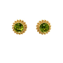 Load image into Gallery viewer, Add a touch of timeless elegance to your jewellery collection with these pre-owned 9ct yellow gold &amp; peridot set round stud earrings, featuring:

Design: Classic round stud earrings, enhanced with a delicate gold rope edging for a refined and vintage-inspired look.
Material: 9-carat yellow gold, offering a warm and luxurious appeal.
Gemstones: Each earring is set with a 6mm diameter peridot, known for its vibrant green hue and natural brilliance.
Weight: A well-balanced 1.80 grams
