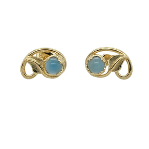 Add a touch of natural charm and colour to your jewellery collection with these pre-owned 9ct yellow gold leaf stud earrings, featuring:

Design: A delicate leaf-inspired design with a vibrant blue stone at the centre, blending botanical elegance with a pop of colour.
Material: 9-carat yellow gold, offering a warm, polished finish that beautifully complements the vivid stones.
Gemstone Detail: Each earring is set with a 5mm diameter blue stone, adding eye-catching sparkle and contrast.

