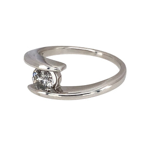 Preowned 9ct White Gold & Diamond Set Wrap over Solitaire Ring in size N with the weight 3.50 grams. The diamond is approximately 46pt - 50pt with approximate clarity i2 and colour M - R