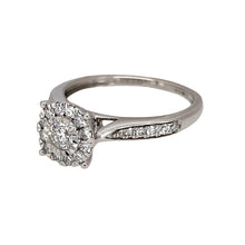 Load image into Gallery viewer, Preowned 9ct White Gold &amp; Diamond Illusion Set Halo Solitaire Ring in size O with the weight 2.80 grams. The shoulders are set with diamonds and there is approximately 50pt of diamond content set in total
