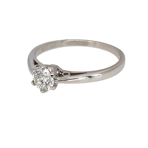 Preowned 18ct White Gold & Diamond Set Solitaire Ring in size L with the weight 2 grams. The brilliant cut diamond is approximately 33pt with approximate clarity i1 and colour J - L