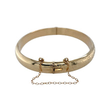 Load image into Gallery viewer, Preowned 9ct Yellow Gold Engraved Hinged Bangle with the weight 10.90 grams. The bangle width is 8mm and the bangle diameter is 6cm
