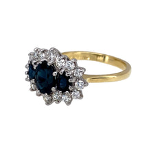 Load image into Gallery viewer, Preowned 18ct Yellow and White Gold Diamond &amp; Sapphire Set Trilogy Cluster Ring in size N with the weight 4.70 grams. The center stone is 7mm by 5mm and the side stones are each 4mm by 3mm
