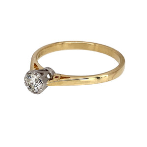 Preowned 9ct Yellow and White Gold & Diamond Set Solitaire Ring in size R with the weight 2 grams. The diamond is approximately 25pt with approximate clarity Si2