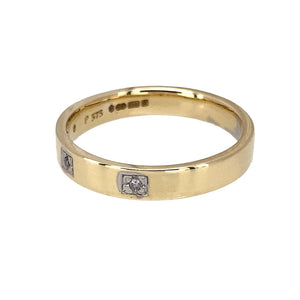 Preowned 9ct Yellow Gold & Diamond Set Band Ring in size P with the weight 3 grams. The band is 4mm wide and there are three diamonds set in the front of the band