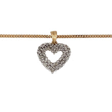 Load image into Gallery viewer, Preowned 9ct Yellow and White Gold &amp; Diamond Set Open Heart Pendant on an 18&quot; curb chain with the weight 3.70 grams. The pendant is 1.9cm long including the bail
