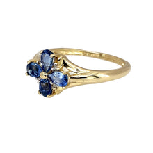 Load image into Gallery viewer, Preowned 9ct Yellow Gold Diamond &amp; Cornflower Blue Stone Set Flower Ring in size Q with the weight 2.70 grams. The front of the ring is 11mm high and the blue stones are each 5mm by 3mm
