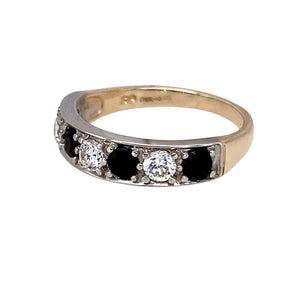 Preowned 9ct Yellow and White Gold & Sapphire & Cubic Zirconia Set Band Ring in size L with the weight 2.40 grams. The front of the band is 4mm wide and the stones are each 3mm diameter