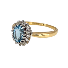 Load image into Gallery viewer, Preowned 18ct Yellow and White Gold Diamond &amp; Blue Topaz Set Cluster Ring in size L with the weight 3.60 grams. The topaz stone is 7mm by 5mm
