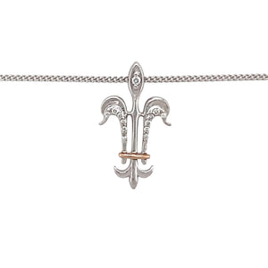 Preowned 9ct White and Rose Gold & Diamond Set Clogau Royal Lily Style Pendant on an 18" Clogau curb chain with the weight 3.50 grams. The pendant is 2.2cm long