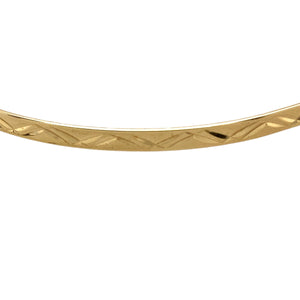 Preowned 9ct Yellow Solid Gold Patterned Bangle with the weight 3.90 grams. The bangle width is 3mm and the bangle diameter is 6.6cm