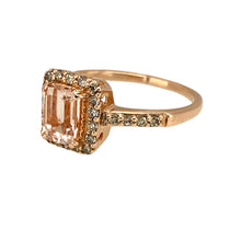 Load image into Gallery viewer, Preowned 14ct Rose Gold Diamond &amp; Morganite Set Halo Ring in size O with the weight 2.90 grams. The morganite stone is 7mm by 5mm
