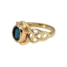 Load image into Gallery viewer, Preowned 9ct Yellow and Rose Gold &amp; Blue Topaz Set Celtic Knot Clogau Ring in size L with the weight 2.70 grams. The blue topaz stone is 6mm by 4mm
