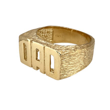 Load image into Gallery viewer, New 9ct Yellow Gold Dad Ring in size X with the weight 9.80 grams. The front of the ring is 12mm high and the shoulders are patterned
