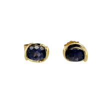 Load image into Gallery viewer, Preowned 9ct Yellow Gold &amp; Iolite Set Stud Earrings with the weight 1.60 grams. The iolite stones are each 7mm by 5mm
