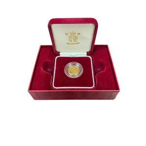 A 22ct Gold boxed Royal Mint Half Sovereign which is Queen Elizabeth II 2003 and has a George and the Dragon reverse