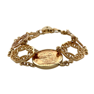 Preowned 9ct Yellow Gold Patterned 7.25" Mount Bracelet with 22ct Gold Full Sovereign and the total weight 30.90 grams. The bracelet has a heart padlock safety chain fashioning and the full sovereign coin is 1912 London Mint