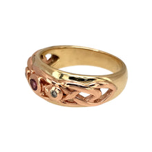 Load image into Gallery viewer, Preowned 9ct Yellow and Rose Gold Diamond &amp; Pink Stone Set Clogau Celtic Ring in size K with the weight 4.60 grams. The front of the band is 8mm wide and the pink stone is 2mm diameter
