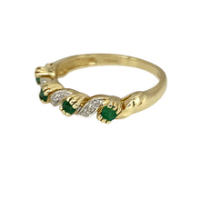 Load image into Gallery viewer, Preowned 9ct Yellow and White Gold Diamond &amp; Emerald Set Twist Style Band Ring in size M with the weight 2.10 grams. The emerald stones are each 2mm diameter
