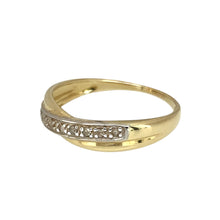 Load image into Gallery viewer, Preowned 9ct Yellow and White Gold &amp; Diamond Set Crossover Band Ring in size P with the weight 1.70 grams. The front of the band is 4mm - 5mm wide
